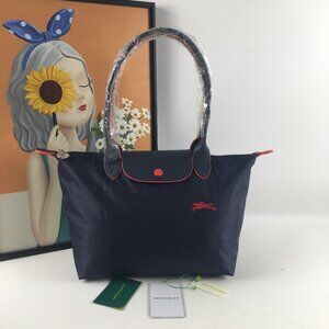 Longchamp Navy Crossbody Tote with Red Trim Accents